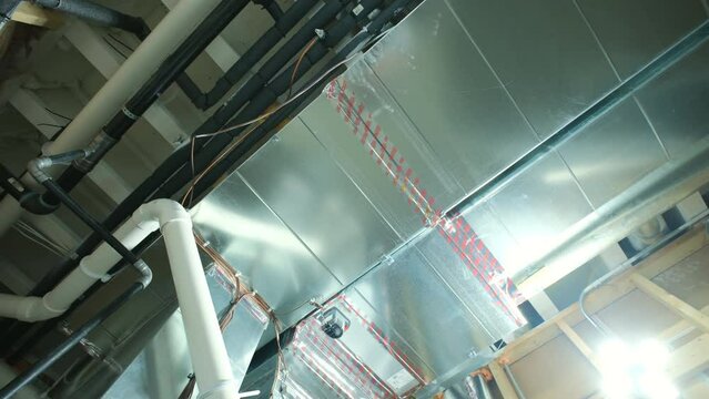 Mounted HVAC system air conditioner and heating system in basement home. Move camera view
