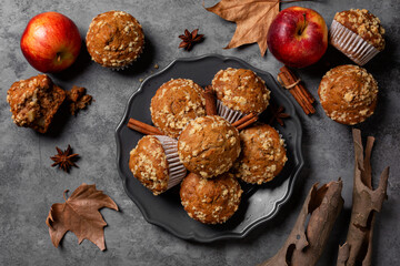 Apple cinnamon streusel muffins. Autumn pastry background. Homemade bakery. Grey background.