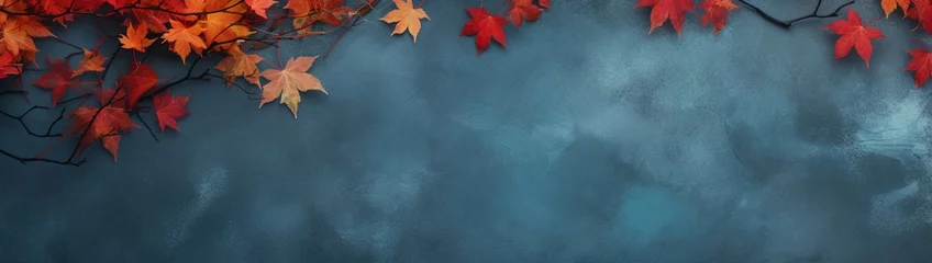 Poster A top-view autumn scene with a stunning contrast of red leaves against a cool blue slate surface, leaving ample room for your creative designs and messages © Abdul