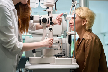 Ophthalmologist uses a diopter meter in his work