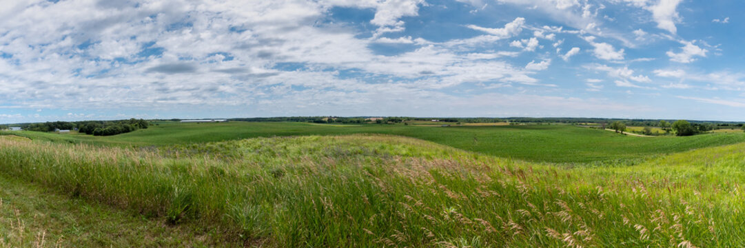 Panoramic view of the fertile countryside with different crops in the fields of rural west central Minnesota, United States.
