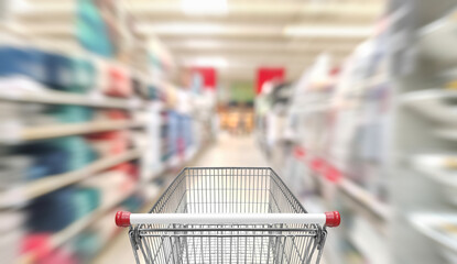 Fast motion in store with trolley.