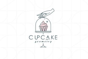 Cake stand with cupcake in art deco style holding by hand drawing on white background