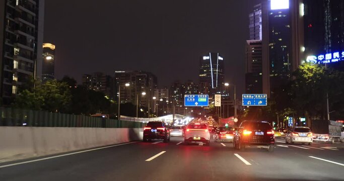Traffic at night on city road in Guangzhou city,China 
