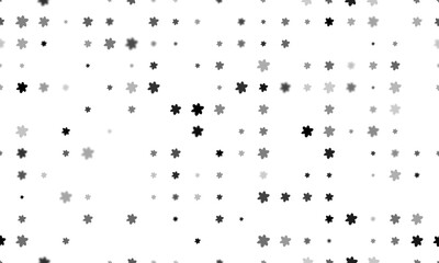 Seamless background pattern of evenly spaced black narcissus flowers of different sizes and opacity. Vector illustration on white background