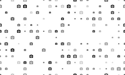Seamless background pattern of evenly spaced black photo camera symbols of different sizes and opacity. Illustration on transparent background
