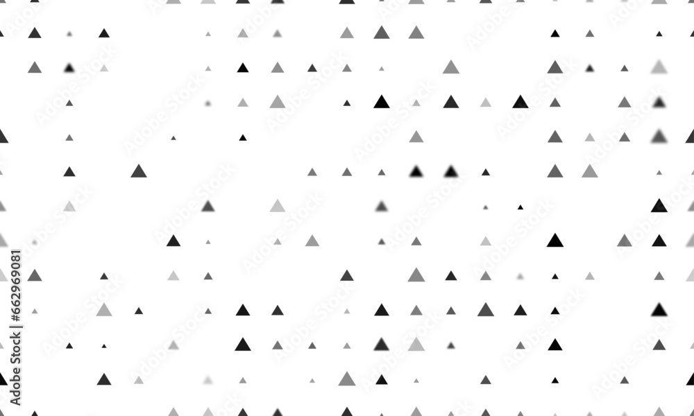Poster seamless background pattern of evenly spaced black triangle symbols of different sizes and opacity. 