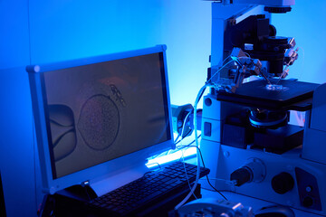 Closeup of ICSI procedure in lab setting