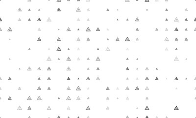 Seamless background pattern of evenly spaced black slippery road signs of different sizes and opacity. Vector illustration on white background
