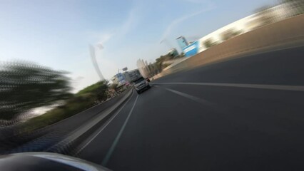 car driving on highway at summarecon bekasi on October 15, 2023 in Bekasi, Indonesia