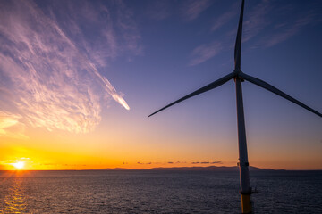 Sunset behind the wind turbine!