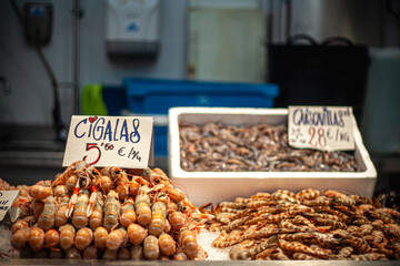 oysters, prawns, langoustines, carabinieri, at a seafood stall in the market
