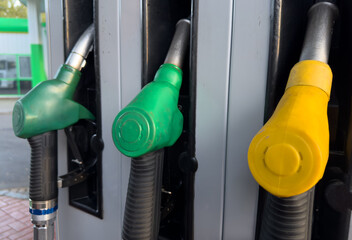 Fump dispenser at petrol station. Fuel price, diesel, gas prices for car and truck. Refueling cars...