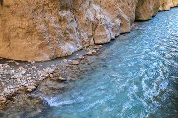 Saklikent Canyon in Turkey with mountain cold stormy water in the river. Natural attraction, popular place for tourists