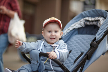 baby in a stroller 8 months, comfortable lightweight stroller for travel.