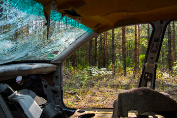Destroyed car in the forest near Asotthalom