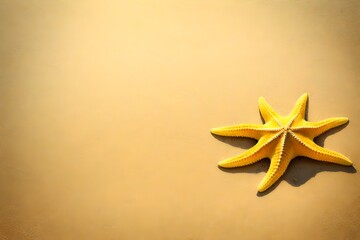 A yellow starfish on a sandy yellow beach.