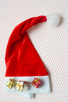 santa claus hat with mini gift boxes on top