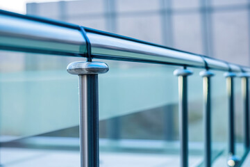 Using hairline stainless steel, the glass railing detail joints. Generative AI
