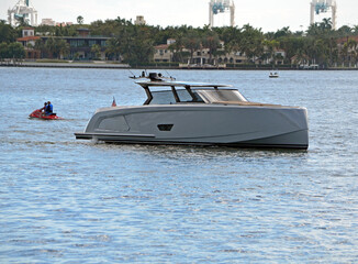Upscale motor boat slowly cruising on the Florida Intra-Coastal Waterway