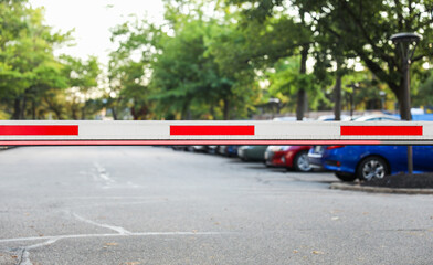 parking lot gate under soft twilight, evoking urban solitude and transition, with subtle textures...