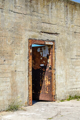 An open, old, rusty door in the recreation area of the former Alcatraz Federal Penitentiary in San...