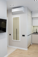 Interior of modern apartment, kitchen. Air conditioner.