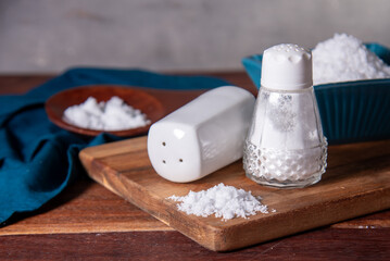 Glass salt shaker on the table