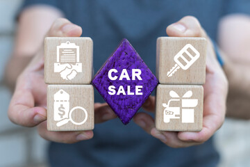 Dealer holding colorful blocks represents conceptual banner: CAR SALE. Car business, car sale, deal...