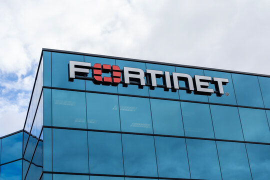 Fortinet Technologies logo sign on the building. Ottawa, ON, Canada - October 15, 2023. Fortinet is a cybersecurity company.
