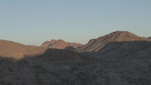 Sunset over desert mountains