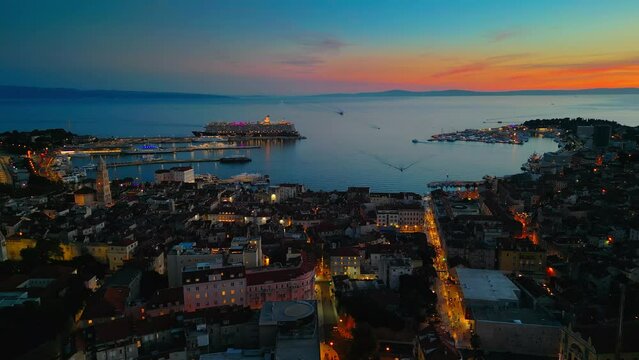 Aerial drone shot of Split, Croatia at night. 