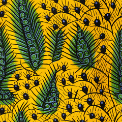 Seamless yellow and green feather pattern. Fruit themed tribal tile illustration