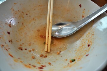 The Empty blow after eating finished. empty blow with chopstick.