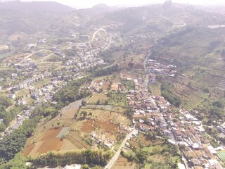 Fototapeta premium Drone Photography. Top down view of Scenic Landscape along Manglayang Mount in the morning, Bandung - Indonesia. Aerial Photography