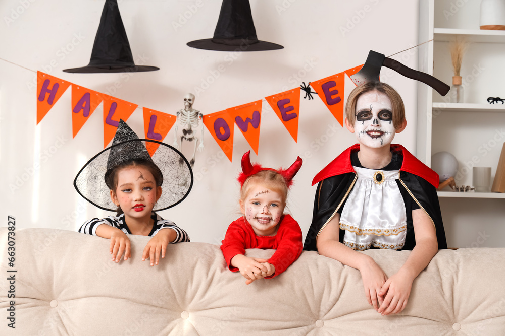 Sticker Little children celebrating Halloween at home