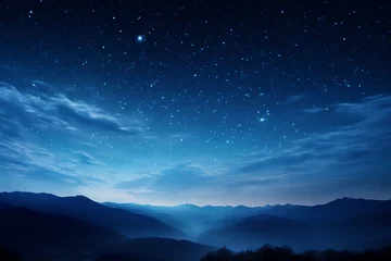 Fotobehang Starry sky at night above the mountain range © fledermausstudio