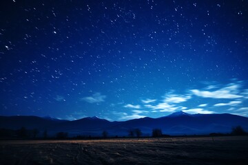 Fototapeta premium Starry sky at night above the mountain range