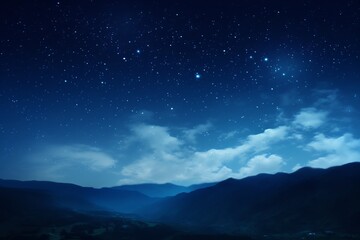 Starry sky at night above the mountain range