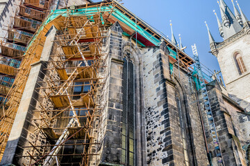 Wooden scaffolding on back wall St. Nicolas Cathedral, in Prague, Czech Republic.
