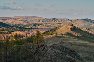 Autumn mountain landscape, view of mountain peaks, mountain valley 