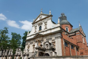 Fototapeta na wymiar Church of St Peter and St Paul with intricate white facade in Krakow, Poland