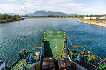 Back view of ferry boat after leaving harbor. KMP BRR headed to sabang island from Banda Aceh. - obrazy, fototapety, plakaty