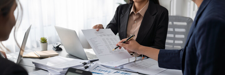 Auditor team collaborate in office, analyzing financial data and accounting record. Expertise in...