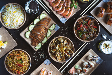 Overhead view of Japanese food served on table