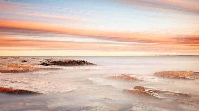 An impressionistic photograph capturing the scenic shoreline of Hudson Bay, Churchill, Manitoba, Canada. This image was created using a panning technique with a slow shutter speed © Chingiz