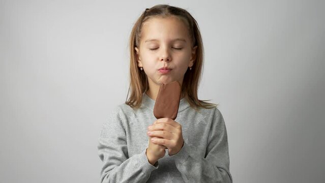 Child with ice cream on a white background