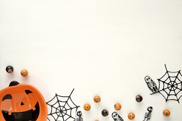 Halloween background mockup for design, product, text presentation, copy space, trick or treat, Halloween party for kids, pumpkin, spider webs, candies.