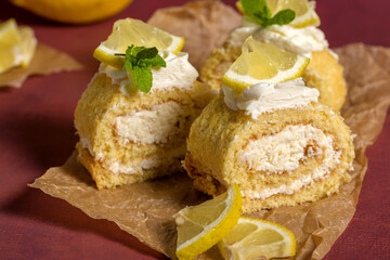 Lemon roll with fruit curd, with mint, close-up