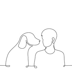 silhouettes of a man and a golden retriever looking at each other - one line art vector. owner and dog concept